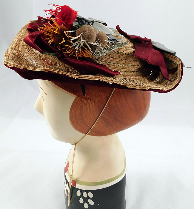 Victorian Womens Natural Straw Pork Pie Wide Brim Bonnet Hat Ribbon Thistle Trim
It is made of woven natural straw, with a decorative basket weave design, burgundy red, blue silk ribbon bows and colorful puff ball flower thistle trimmings on top.