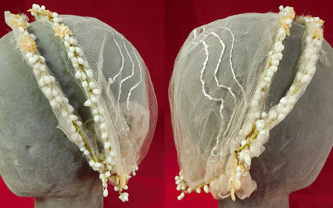 Vintage Wax Flower Bridal Wreath Wedding Headband Headpiece Juliet Cap	
his beautiful bridal garland wreath wedding headpiece has a Juliet cap style sheer tulle net decorative silk stitched back head covering with a double wax flower strand front headband. 