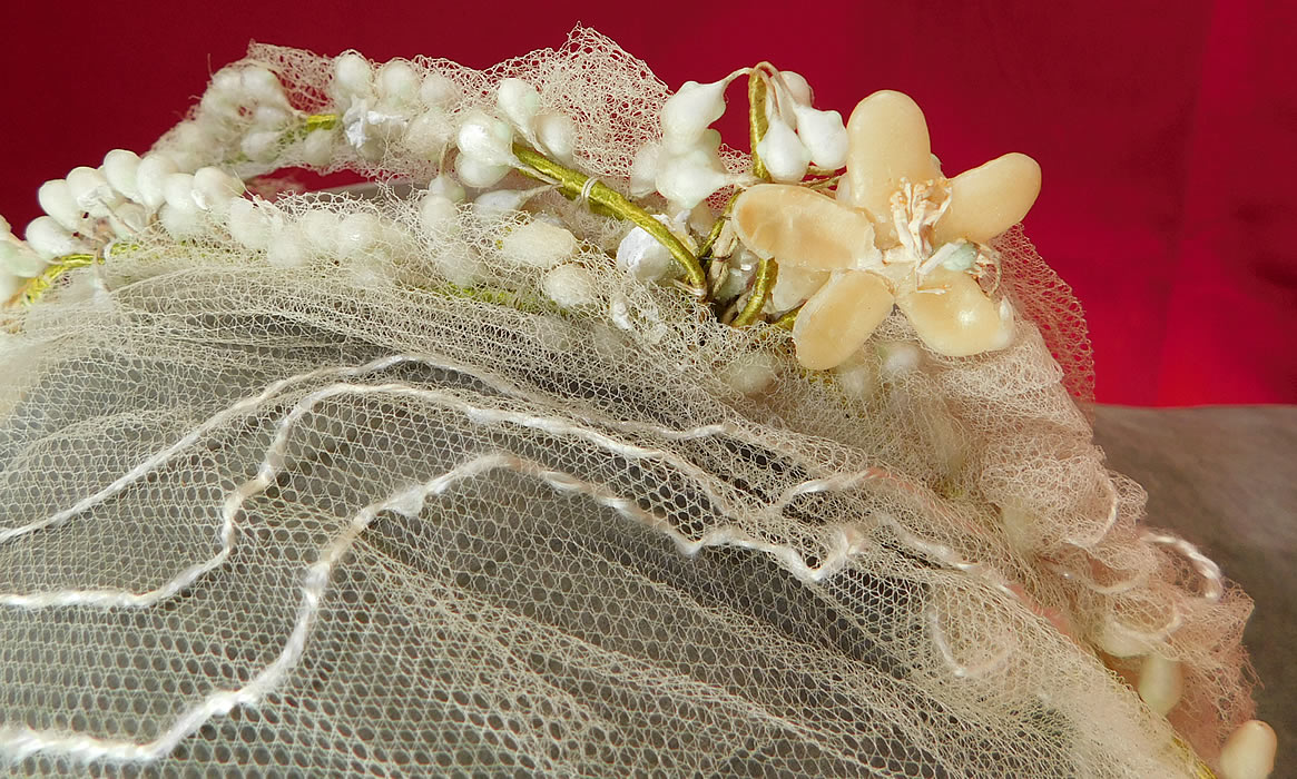 Vintage 1920s Wax Flower Bridal Wreath Wedding Headband Headpiece Juliet Cap
t is in good as-is condition, with only a few missing, broken wax flower petals, droplets and some frays, holes, remnants of the delicate tulle netting in areas.