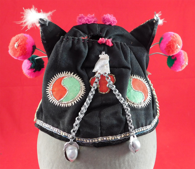 Antique Chinese Bai Miao Minority Childrens Festival Embroidered Tiger Wind Hat
This is truly a beautiful piece of one of a kind antique Chinese children's hat art!
