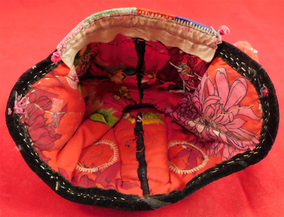Antique Chinese Bai Miao Minority Childrens Festival Embroidered Tiger Wind Hat
The hat measures 19 inches inside crown circumference. 
