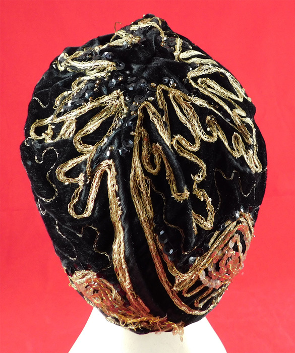 Vintage Wistaria Art Deco Black Velvet Gold Sequin Embroidered Flapper Cloche Hat
The hat measures 21 inches inside circumference.