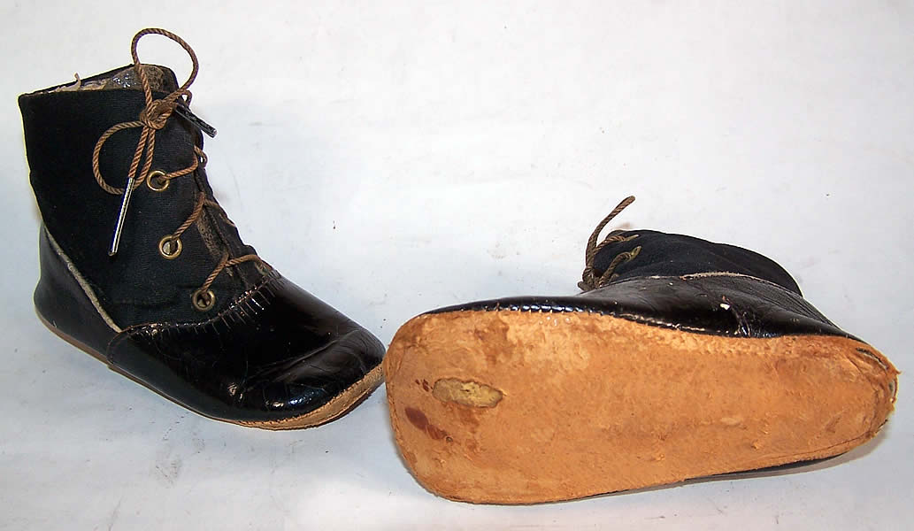 They have been gently worn, with some wear on the leather and a small hole on the bottom sole