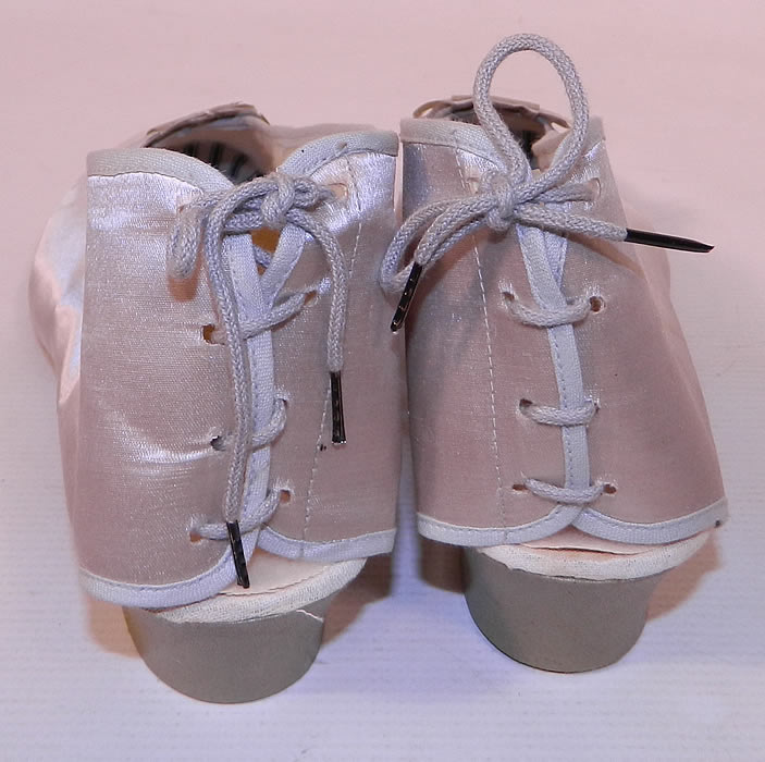 Vintage Practical Burial Slippers Silver Grey Satin Funeral Shoes Pumps. This pair of vintage Practical Burial Slippers silver grey satin funeral shoes pumps and box date from the 1920s.