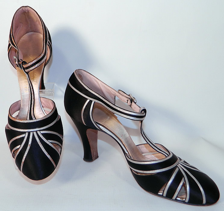 Vintage Saks Fifth Avenue Art Deco Silver Lam&eacute; Black Satin T-Strap Shoes. This pair of vintage Saks Fifth Avenue Art Deco silver lam&eacute; black satin T-strap shoes date from the 1930s.
