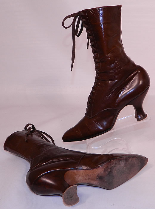 Victorian Marshall Field Co Chicago Brown Leather High Top Lace-up Boots. The boots measure 10 inches tall, 10 inches long, 2 1/2 inches wide, with 3 inch high heels. These antique boots are difficult to size for today's foot but my guess would be about a size 6 or 7 narrow width. 