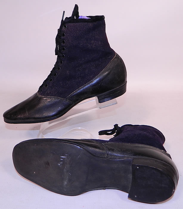 Victorian Black Leather Navy Blue Wool Winter High Top Lace-up Boots . There is black trim edging and laces for closure down the front, rounded toes, hard leather bottom soles and low stacked cube heels.