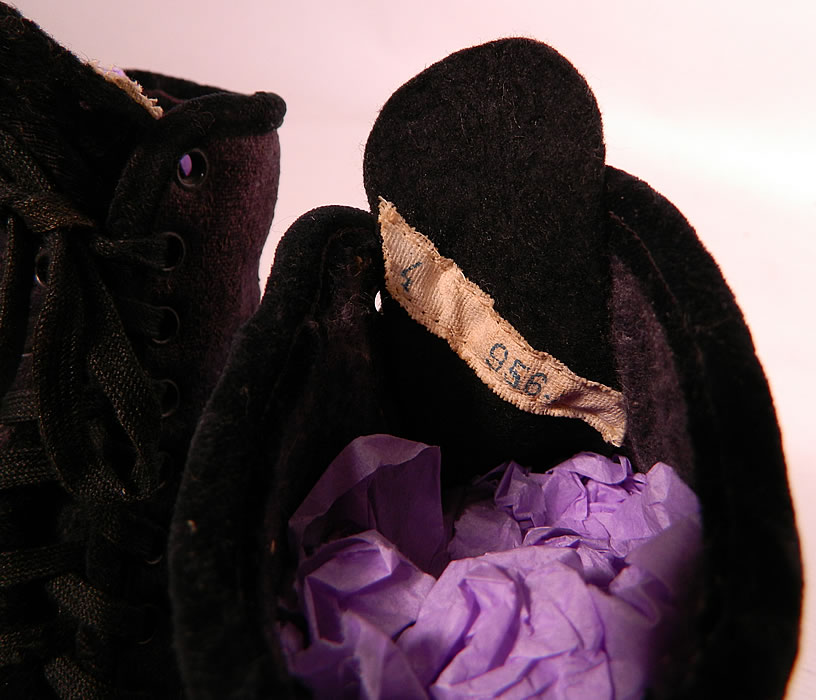 Victorian Black Leather Navy Blue Wool Winter High Top Lace-up Boots .  The boots measure 6  inches tall, 9 1/2 inches long and 3 inches wide. They have been gently worn, with some slight scuffing on the leather toes and dust soiling on the wool  fabric. These are truly a beautiful quality made shoe!