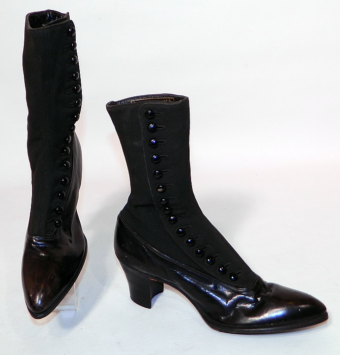 Unworn Victorian Black Wool & Leather High Top Button Boots Poehlman Shoe Co.  The boots measure 9 1/2 inches tall, 10 inches long, 2 1/2 inches wide, with 2 1/2 inch high heels. 
