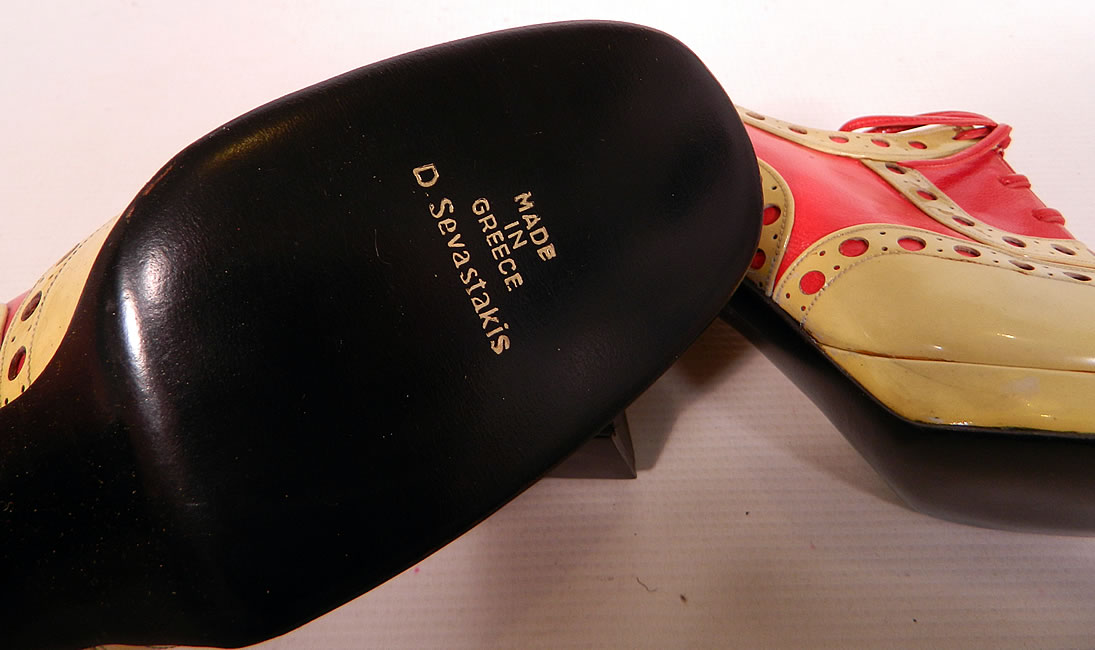 Unworn Vintage Jerry Edouard Joseph Red Eyelet Leather Oxford Platform Shoes & Box. There is a "Jerry Edouard", "Joseph Made in Greece" label gold embossed on the insoles and are stamped on the black bottom soles "Made in Greece D. Sevastakis". 