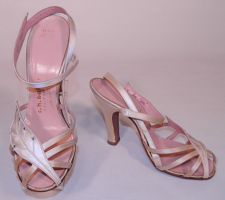 Vintage So Bel Creations by Fern White Satin Rhinestone Leaf Sling Back Sandal Shoes. These stunning summer sandal style shoes have open toes, with crisscrossing straps on the vamps, a wrap around sling back ankle strap and satin covered modified boulevard heel.