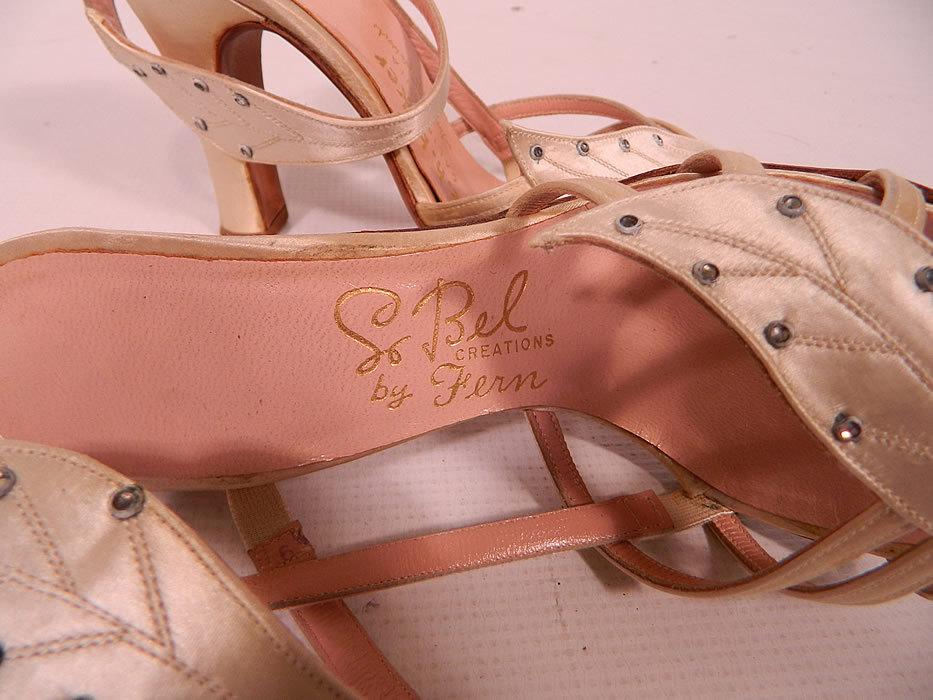 Vintage So Bel Creations by Fern White Satin Rhinestone Leaf Sling Back Sandal Shoes. They have a pink insole lining with a gold embossed label inside "So Bel Creations by Fern", "C.H. Baker California" and are stamped a size 6 1/2 M.