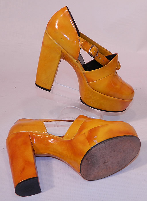 Vintage Mignani Right Bank Clothing Yellow Patent Leather  Platform Shoes. These fabulous funky shoes have a platform front lift style, with rounded toes, chunky high heels and side buckle adjustable twist straps.
