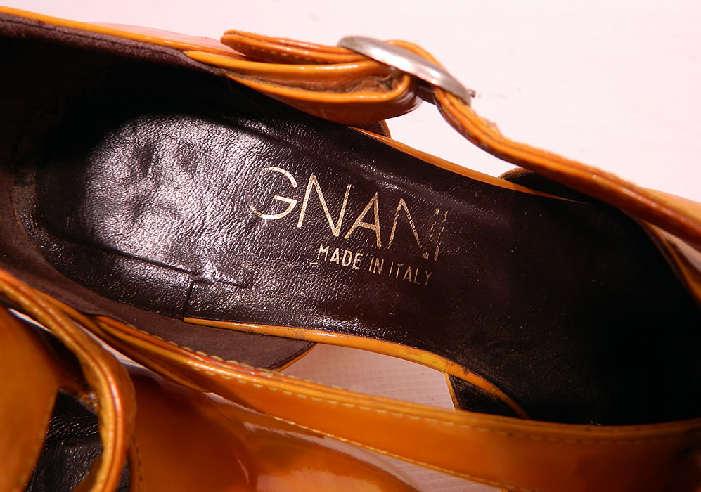 Vintage Mignani Right Bank Clothing Yellow Patent Leather  Platform Shoes. There is gold embossed lettering a "Mignani Made in Italy" designer label in one shoe and "The Right Bank Clothing Co." store label stamped inside the other shoe. 