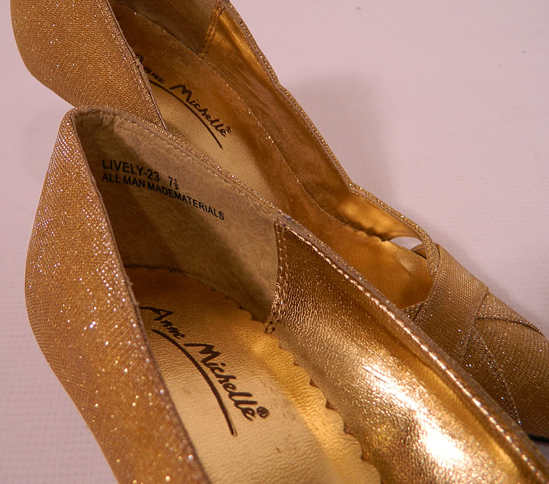 Vintage Anne Michelle Winklepickers Gold Lame Lam&eacute; Stiletto Heel Shoes. There is a "Anne Michelle" label embossed on the insoles. The shoes measure 10 inches long, 3 inches wide, with 4 inch high heels and is stamped inside a size 7 1/2. 