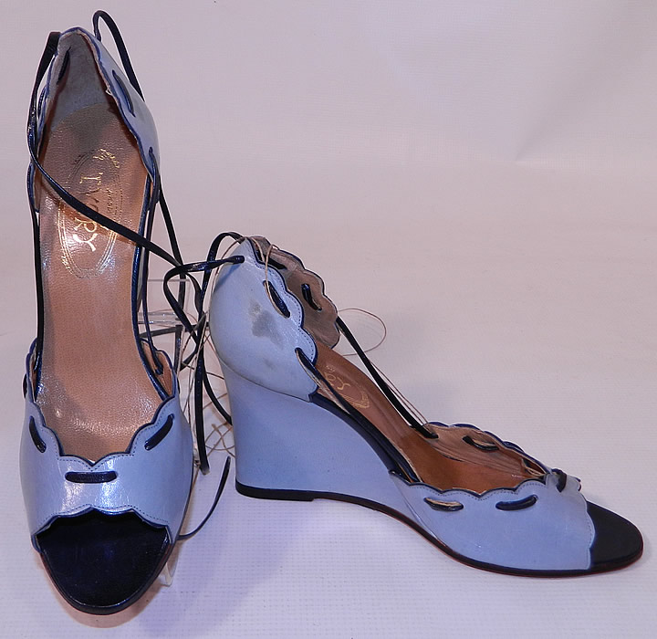 Vintage Shoes by Ivory Blue Leather Floral Embroidery Ankle Strap Wedge Heel. They are in good, unworn condition, with only a few smudge marks on the leather and some fraying of the lacing. These are truly a wonderful piece of quality made wearable shoe art!