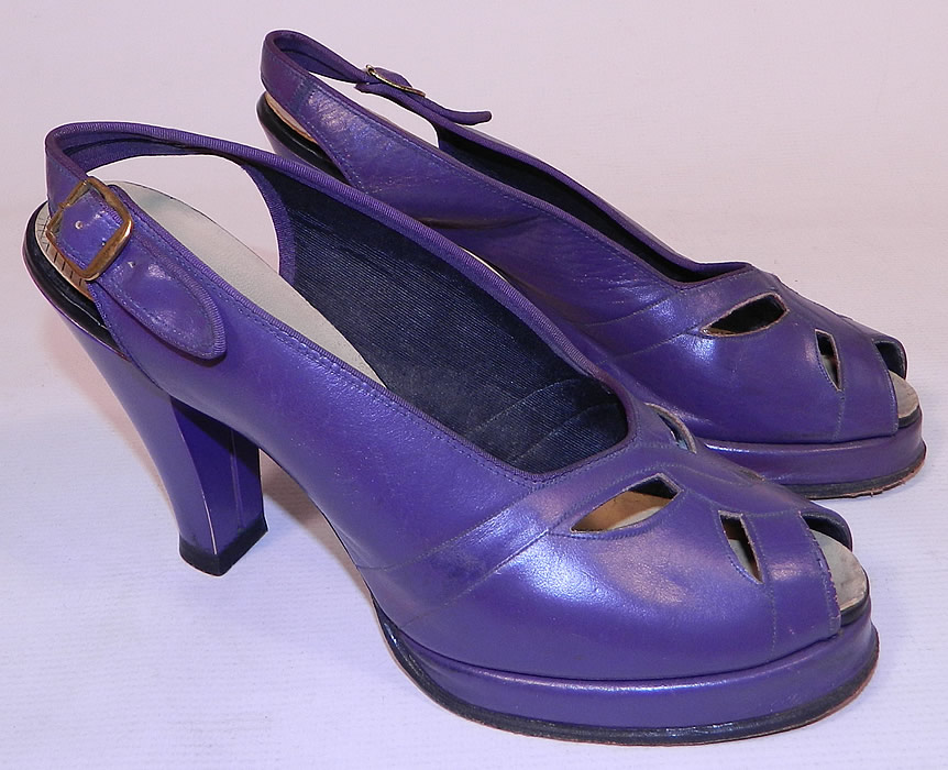 Vintage Alyson Style Classics Purple  Leather Slingback Platform Shoes
They are made of a purple leather, with an eyelet cut out pattern design on the front instep vamps. 