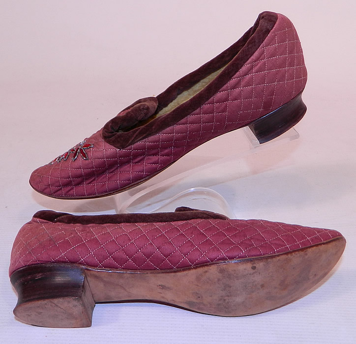 Victorian Burgundy Quilted Silk Steel Cut Beaded Velvet Trim Slipper Shoes
The shoes measure 10 inches long, 2 1/2 inches wide, with a 1 inch high heel. 