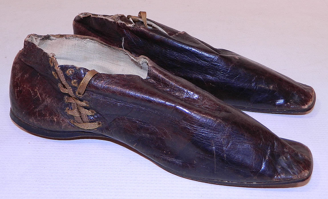 Victorian Brown Leather Crooked Sole Side Lacing Dainty Ankle Half Boots
This pair of antique Victorian era brown leather crooked sole side lacing dainty ankle half boots date from the 1850s.