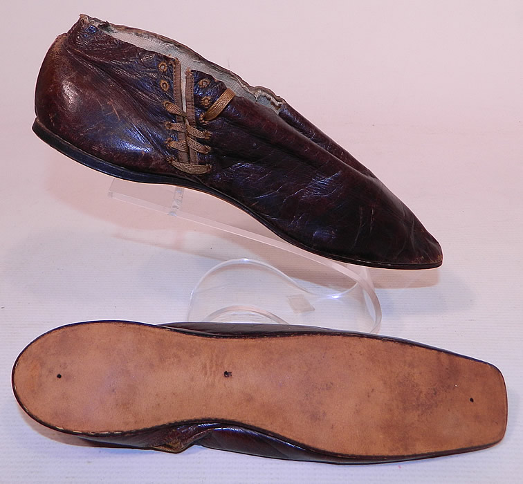 Victorian Brown Leather Crooked Sole Side Lacing Dainty Ankle Half Boots
These early dainty half boot shoes have a slightly crooked hard leather bottom sole stamped with the number 5, squared toes and a low slight heel.