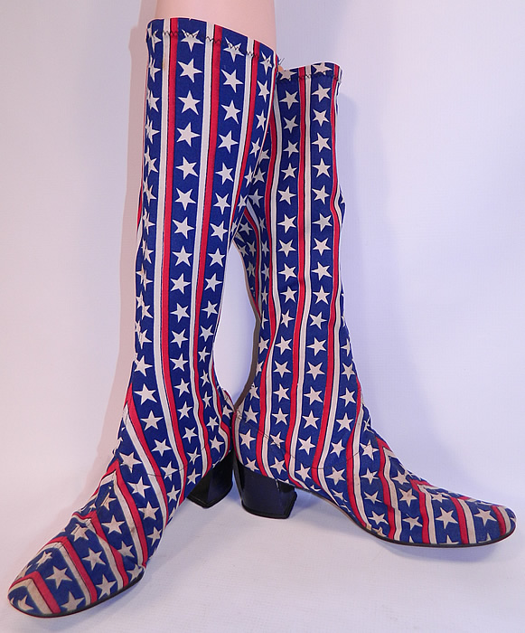 Vintage Patriotic Red White Blue Stars & Stripes Stretch Fabric Knee High GoGo Boots
These patriotic American flag style rockstar gogo boots are knee high, with stretch elastic tops, rounded fabric toes and navy blue leather covered chunky cube heels.