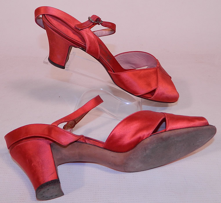 Vintage O'Connor & Goldberg Red Silk Satin Ankle Strap Evening Shoes
They are in good condition and have been gently worn, with only some minor wear. These are truly a wonderful piece of wearable shoe art!
