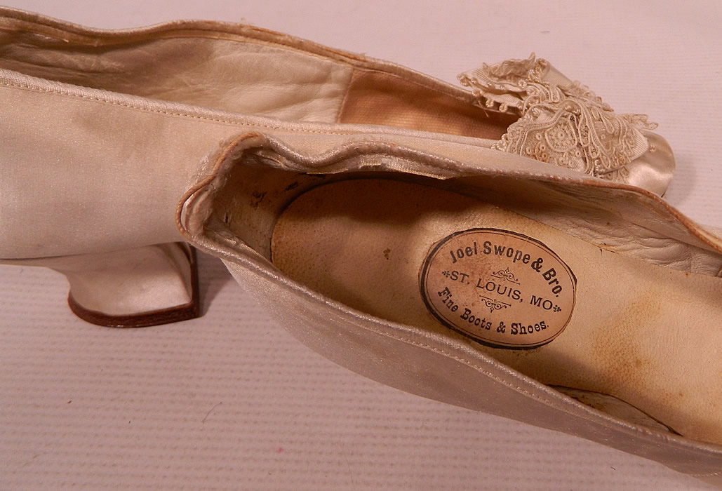 Victorian Joel Swope & Bro. Label White Silk Lace Bow Bridal Wedding Shoes
They are lined in kid leather, with a "Joel Swope & Bro. St. Louis, MO Fine Boots & Shoes" label inside. 