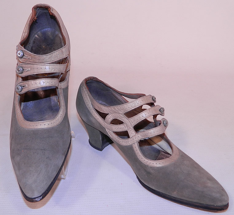 Vintage R.H. White Co. Gray Suede Leather Button Strap Mary Jane Flapper Shoes
The shoes measure 10 inches long, 2 1/2 inches wide, with a 2 inch high heel. My guess on size would be a 7 narrow width. 