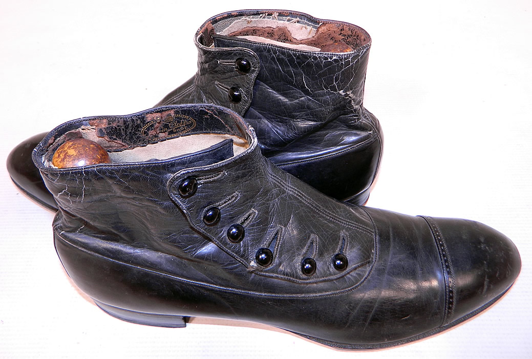 Victorian Vintage Edwin Clapp Shoe Mens Black Leather High Button Boots
They are in good condition, with only some faint scuff marks on the toes, cracked crease marks on the back and the inside top leather lining is flaking, missing in areas. 