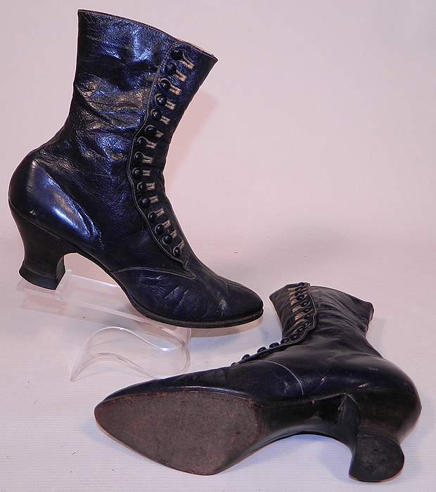 Victorian Women's Navy Blue Leather High Top Button Boots
The boots measure 9 inches tall, 10 1/2 inches long, 3 inches wide, with 2 1/2 inch high heels. These antique boots are difficult to size for today's foot, but my guess would be about a US size 6 or 7 narrow width. 