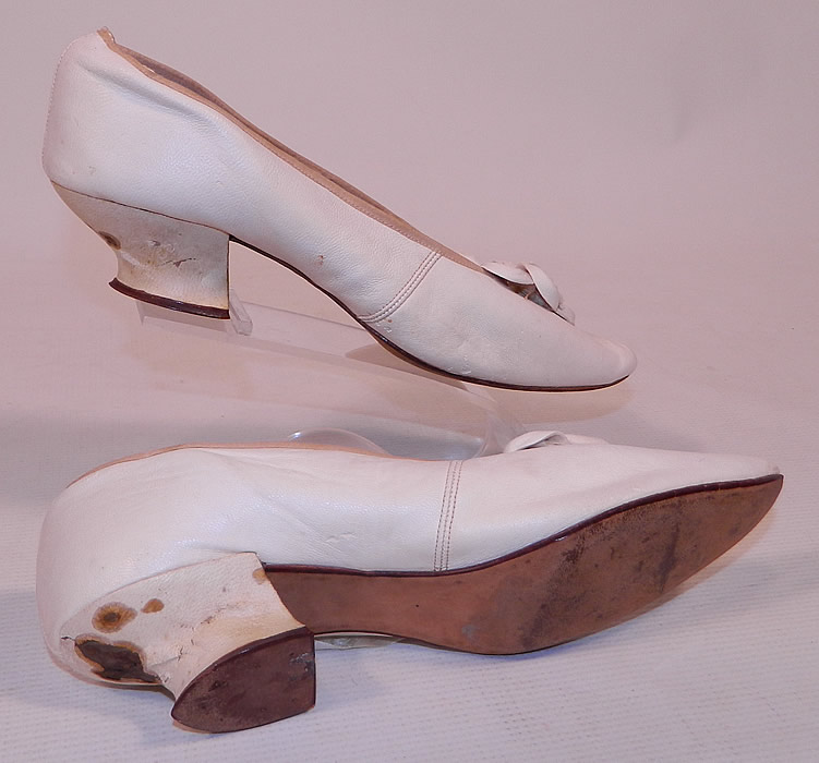 Victorian White Kid Leather Bow Trim Silk Ribbon Ties Wedding Shoes
The shoes measure 10 inches long, 2 1/2 inches wide and a 1 1/2 inch high heel. 