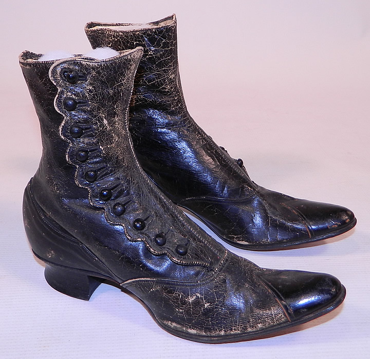 Unworn Victorian Scalloped Side Button Black Leather High Top Boots
They are made of black leather, with decorative scalloped side edging. 