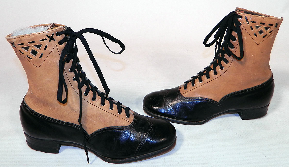 Edwardian Black & Tan Two Tone Leather Lacing Cutouts High Top Boots Shoes
The boots have the original black shoe string laces, rounded toes and low stacked black wooden cube heels. The boots measure 8 inches tall, 10 inches long, 3 inches wide, with 1 inch high heels. 