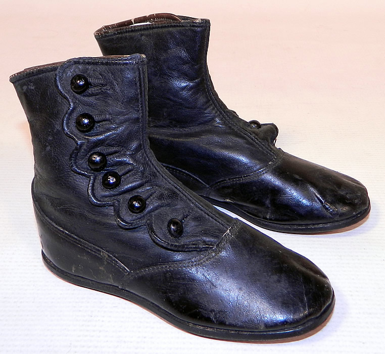 Victorian Antique Black Leather High Button Button Baby Boots Childs Shoes
This pair of antique Victorian era black leather high button baby boots child's shoes date from 1870. 