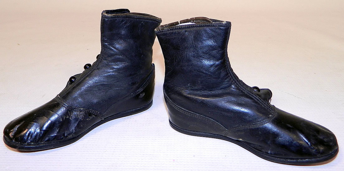 Victorian Antique Black Leather High Button Button Baby Boots Childs Shoes
The boots measure 4 inches tall, 6 inches long and are 2 inches wide. They have been gently worn and are in good condition, with only some scuff marks, creases on the leather from storage. These are truly a quality made children's shoe!