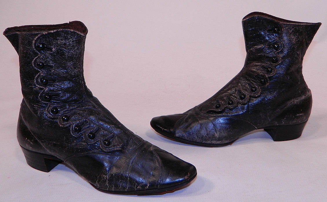 Victorian Antique Scalloped Side Button Black Leather High Top Boots
This pair of antique Victorian era scalloped side button black leather high top boots date from the 1870s. 