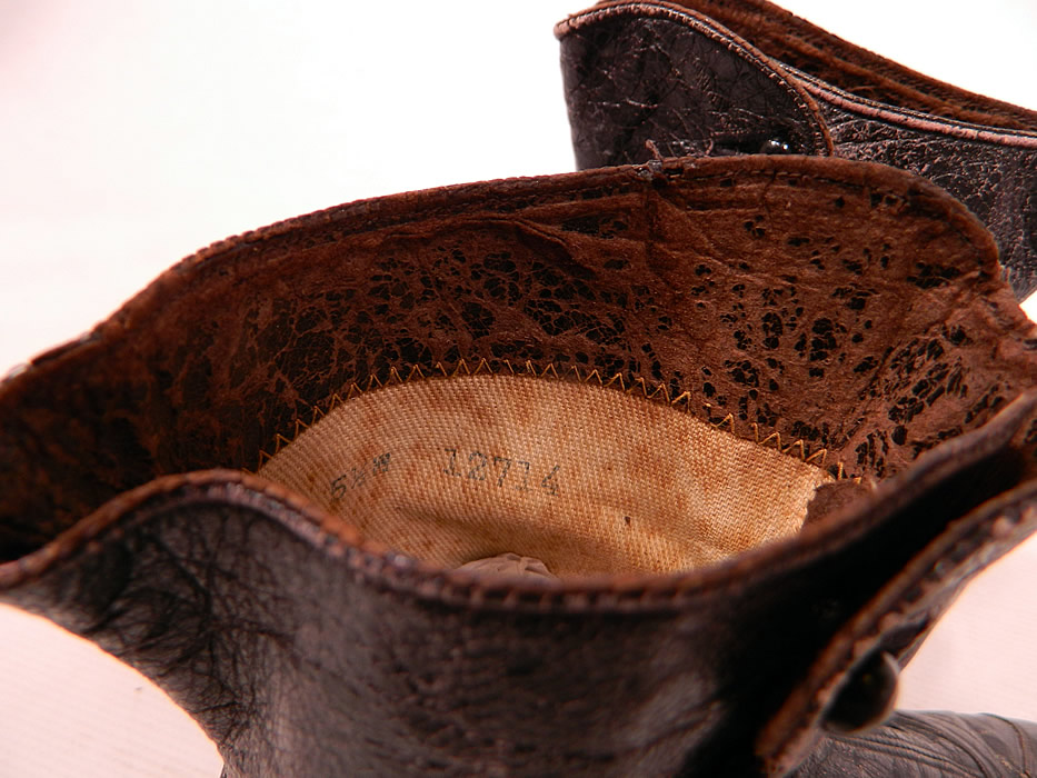 Victorian Antique Scalloped Side Button Black Leather High Top Boots
The boots measure 10 inches long, 3 inches wide, with 1 1/2 inch high heels and are stamped inside a size 5 1/2. 