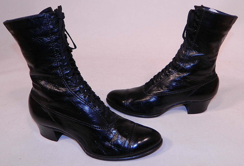Unworn Victorian Vintage Patrician Label Black Leather High Top Lace-up Boots
This pair of vintage Patrician label unworn Victorian era antique black leather high top lace-up boots dates from 1900. They are made of a supple black leather, with decorative punch work designs. 