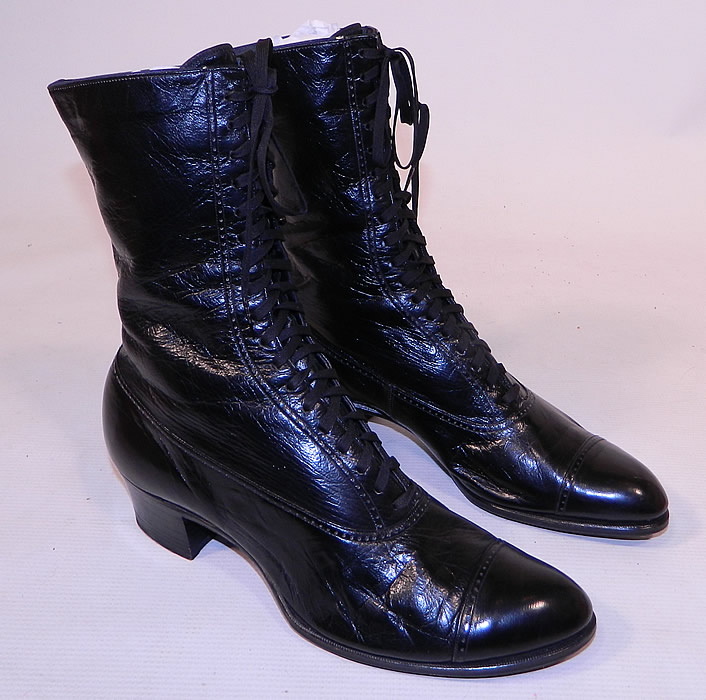 Unworn Victorian Vintage Patrician Label Black Leather High Top Lace-up Boots
These beautiful black boots have rounded toes, the original black shoe string laces for closure and black stacked wooden cube heels.