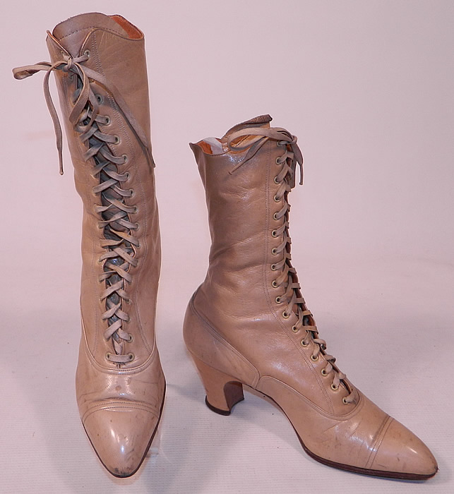 Victorian Antique Ecru Beige Leather High Top Lace-up Boots Swope Shoe Co.
The boots have pointed toes, the original beige shoe string laces for closure and leather covered Louis XV French heels. 