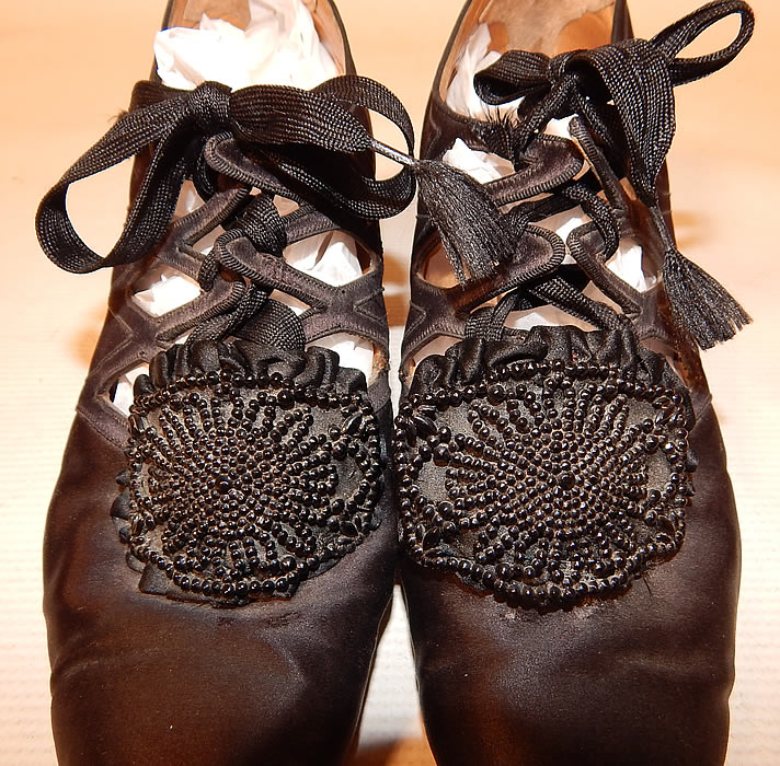 Vintage Thayer McNeil Co Boston Black Silk Beaded Buckle Eyelet Flapper Shoes
The shoes measure 9 1/2 inches long, 3 inches wide, with a 2 inch high heel.