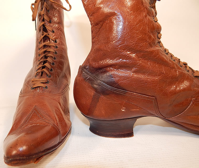 Victorian Antique Womens Brown Leather High Top Lace-up Boots Shoes
They have been gently worn and are in good condition, with only a water spot stain on the back of one shoe (see close-up). These are truly a wonderful quality made antique boot! 