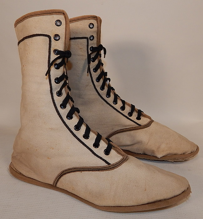 Edwardian Ecru Cream Cotton Canvas Sporting Swim Shoes Bathing Boots
These wonderful womans sportswear swim shoes high top bathing boots have eyelet lacing up the front, rounded toes and canvas bottom soles.