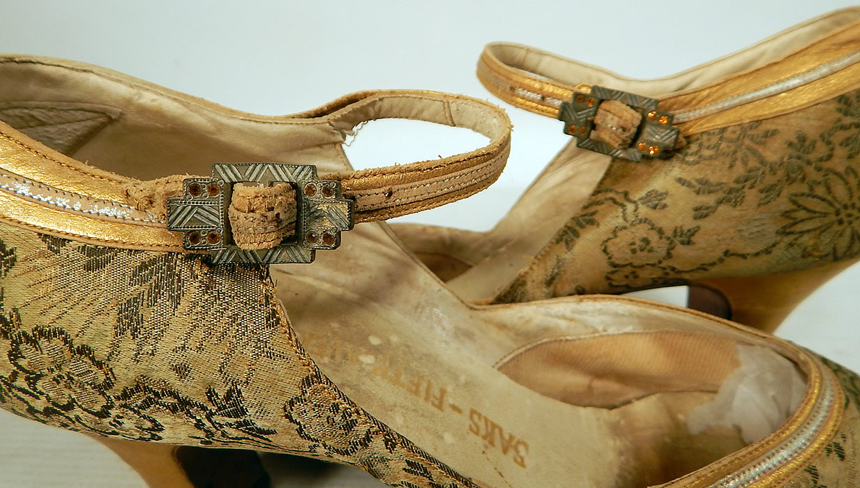 Vintage Saks Fifth Avenue Art Deco Gold Silver Leather Lam&eacute; Lame Brocade Flapper Shoes
They have been gently worn and are in good as-is condition, with only some slight faint tarnish discoloration and a few tiny frays. These are truly a wonderful quality made shoe and wearable Art Deco shoe art! 