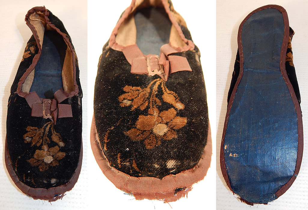 Antique Georgian Regency 1820 Floral Embossed Velvet Childs Single Slipper Shoe
 This antique Georgian Regency era floral embossed velvet child's single slipper shoes dates from 1820. It is hand stitched, made of a silk velvet fabric with an embossed floral pattern design and brown silk ribbon trim edging. This girls fancy slipper shoe has a slip on style, rounded toes, with brown silk trim edging along the top, bottom, a ribbon bow buckle trim on the front, a blue oilcloth fabric soft sole bottom and is lined in a home spun linen fabric inside.
