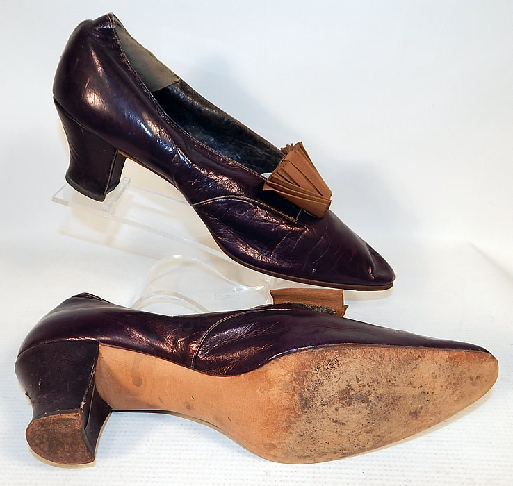 Edwardian Vintage Peter Robinson London Label Iridescent Aubergine Leather Shoes
The shoes measure 11 inches long, 2 1/2 inches wide, with a 2 inch heel. They have been gently worn and are in good condition. These are truly a beautiful quality made antique shoe!