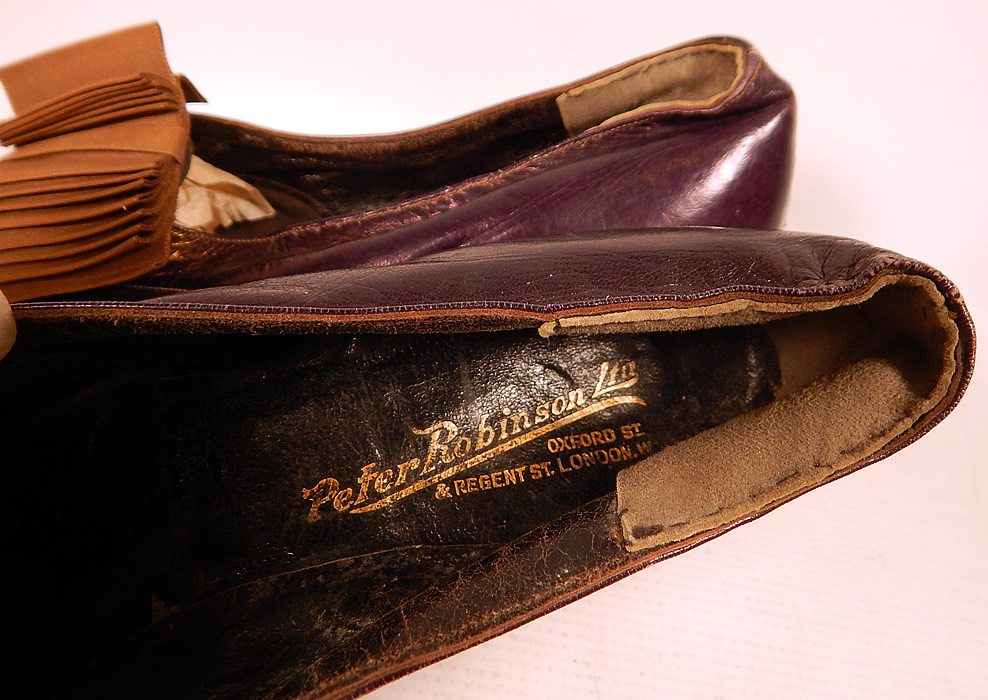 Edwardian Vintage Peter Robinson London Label Iridescent Aubergine Leather Shoes
They are lined and have a gold embossed stamped "Peter Robinson Ltd. London" label inside. 