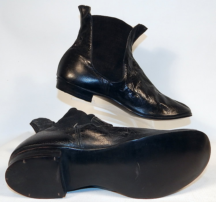 Unworn Antique Victorian Black Leather Hub Gore Elastic Side Dainty Ankle Half Boots
These handsome dainty half boot shoes have rounded toes, a low stacked cube heel and elastic ribbed textured fabric gusset insert sides. 