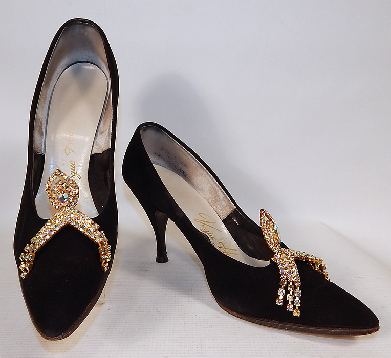 Vintage Vogue House Black Suede Leather Stiletto Heel Pumps Rhinestone Shoe Buckles
This pair of vintage Vogue House black suede leather stiletto heel pumps rhinestone shoe buckles date from the 1960s.
