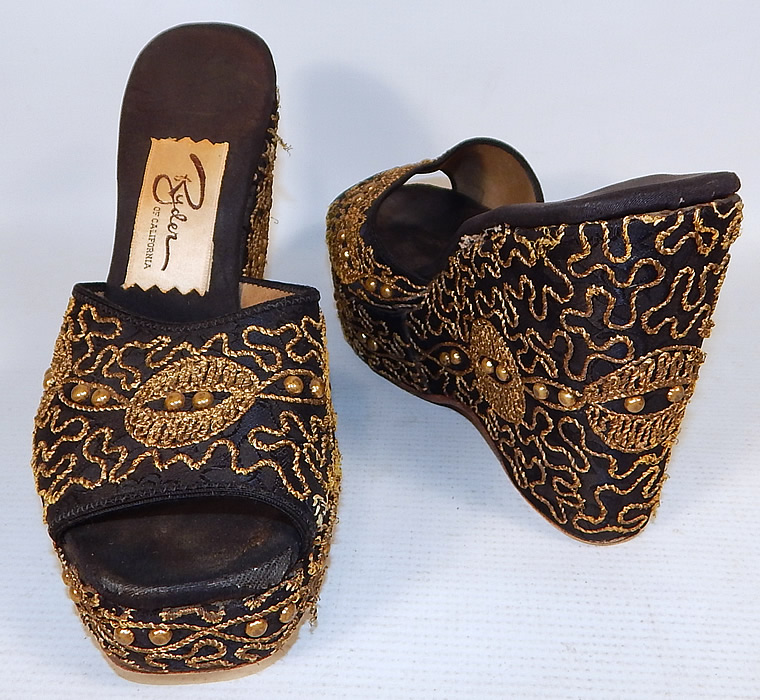 Vintage Ryder of California Black Gold Studded Soutache Wedge Heel Platform Shoes
These sexy backless mule style shoes have a platform lift front, open toes, a wedge high heel and have "Ryder of California" label on the insoles.